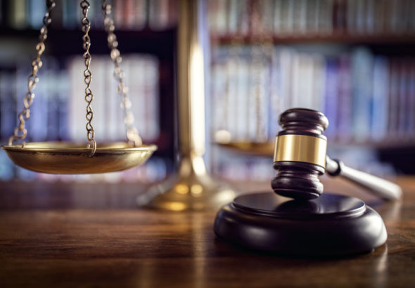 Judge,Gavel,,Scales,Of,Justice,And,Law,Books,In,Court